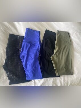 4 pack leggings- size small. Black houndstooth, blue, black, olive green.